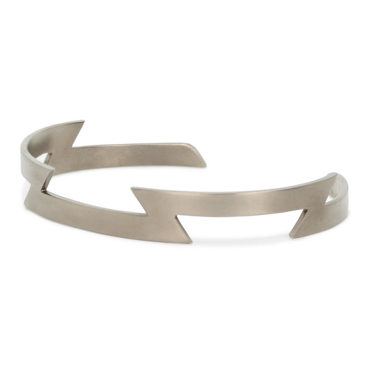 Maxwell Pontail titanium bracelet showcasing sleek arrows and matte finish.